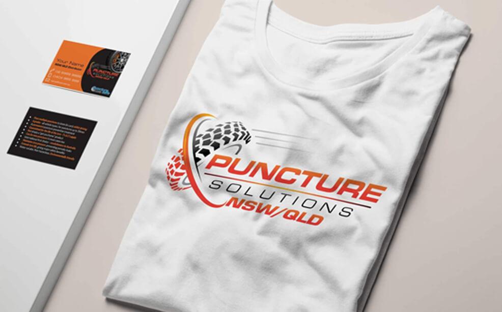 puncture solution logo on t shirt